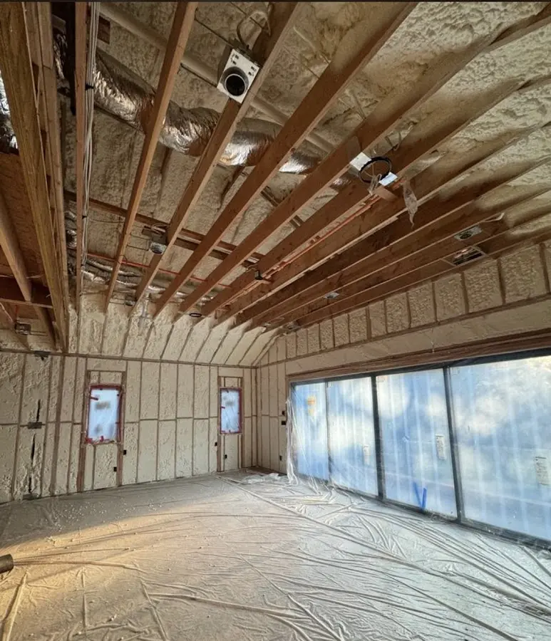 Interior walls and ceiling insulated with spray foam during new construction in Withamsville